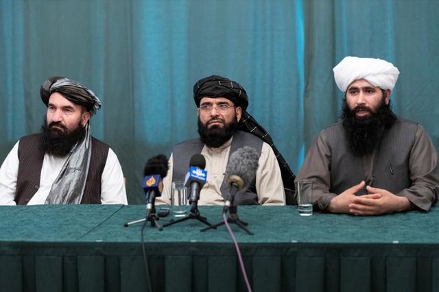 Members of the Taliban delegation: former western Herat Governor Khairullah Khairkhwa, member of the negotiation team Suhail Shaheen and spokesman for the Taliban's political office Mohammad Naeem attend a joint news conference in Moscow, Russia March 19, 2021. Alexander Zemlianichenko/Pool via REUTERS
